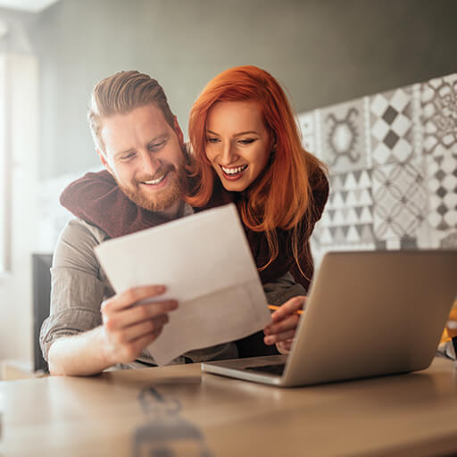 Happy Couple with paper