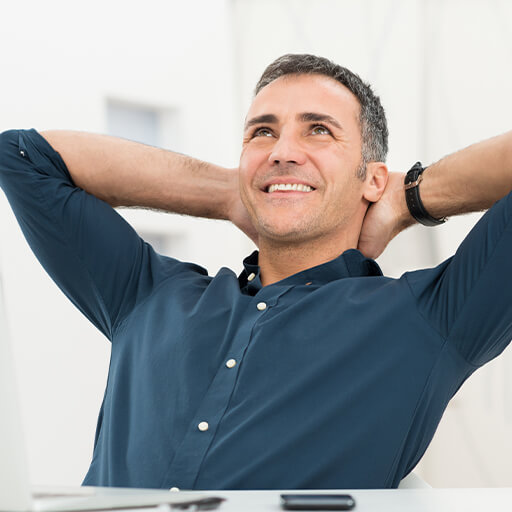 Happy man leaning back